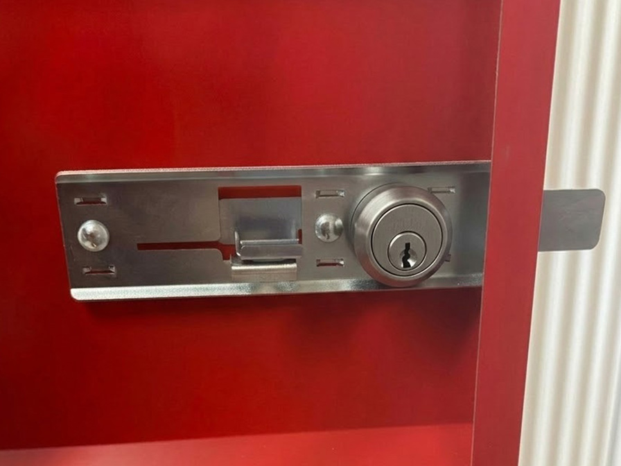 DuoClose lock with double padlock installed on stall door